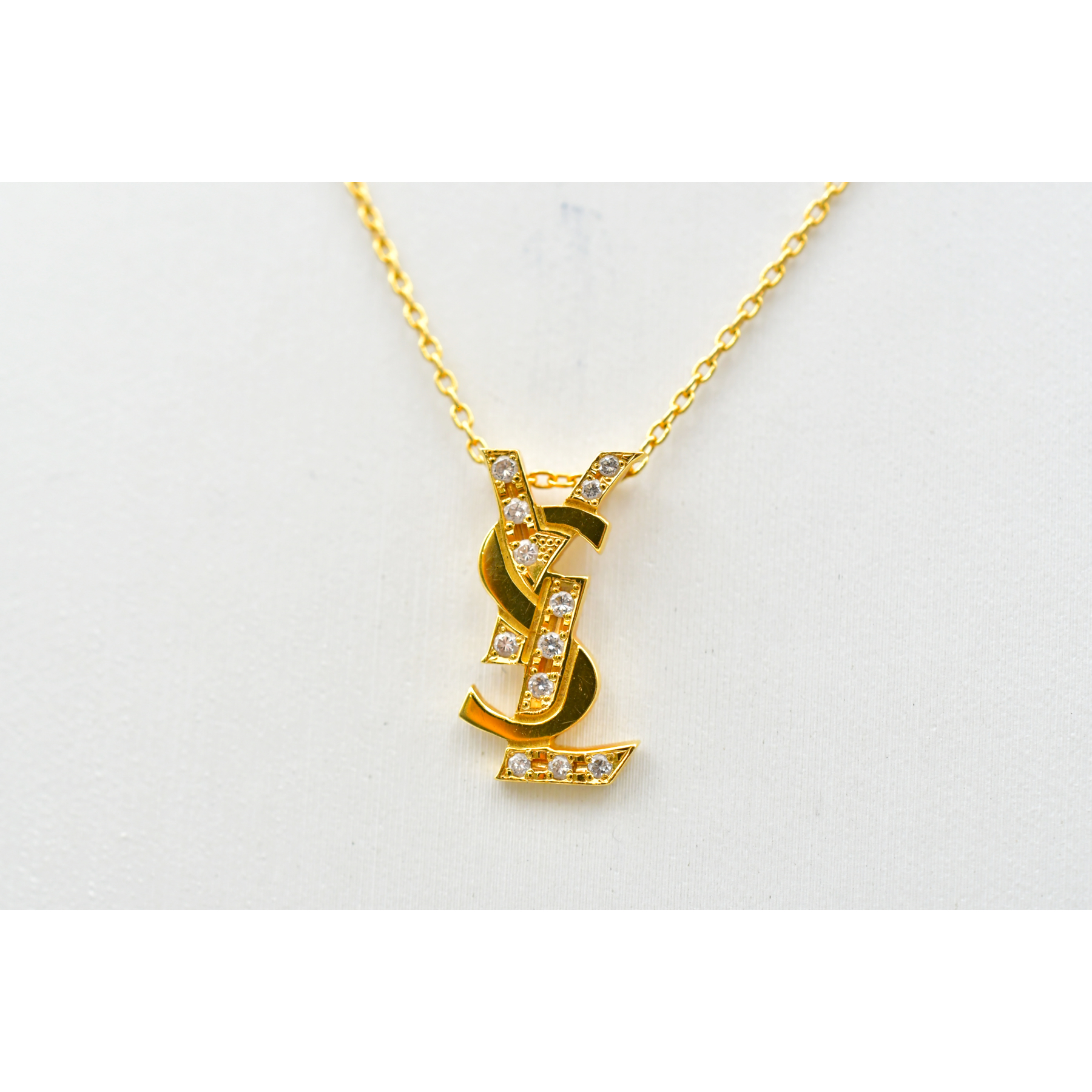 サンローラン YSLロゴネックレス K18 0.11ct 買取実績【買取日