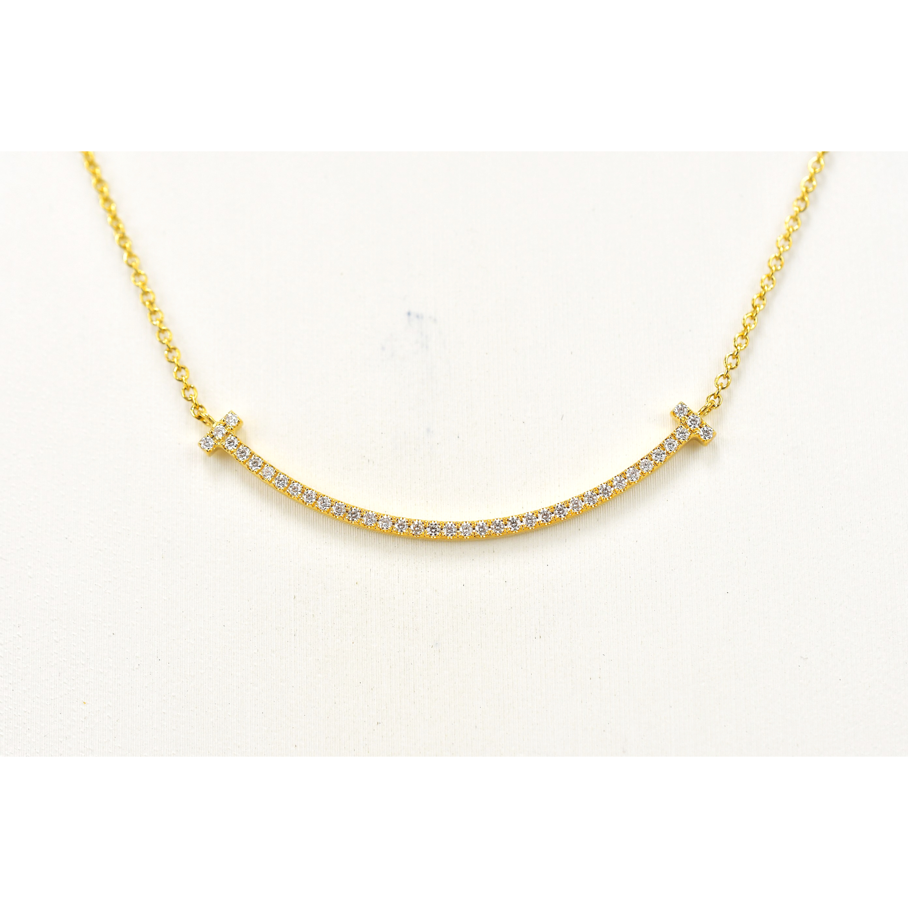 ティファニー Tスマイル スモール ダイヤネックレス YG Aランク