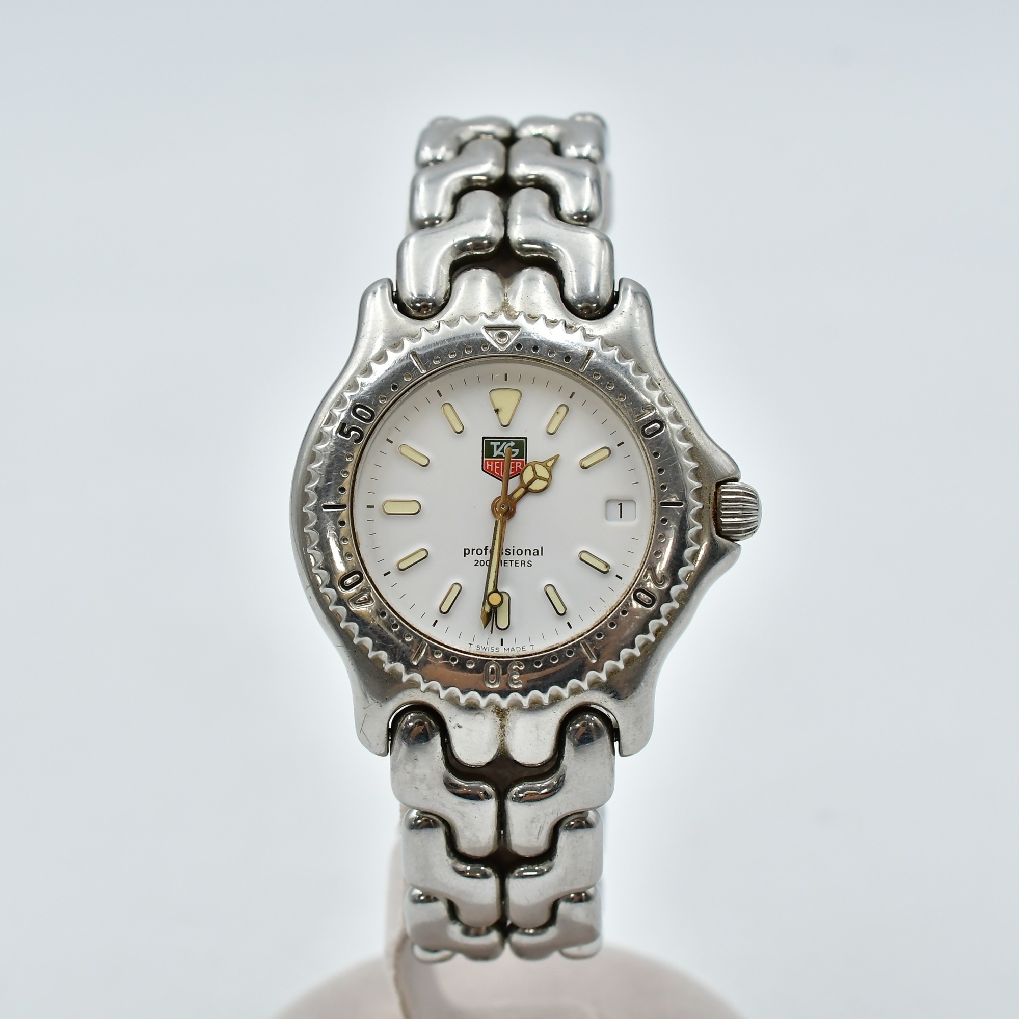 タグホイヤー プロフェッショナル 白文字盤 SS/QZ S90.806K 買取