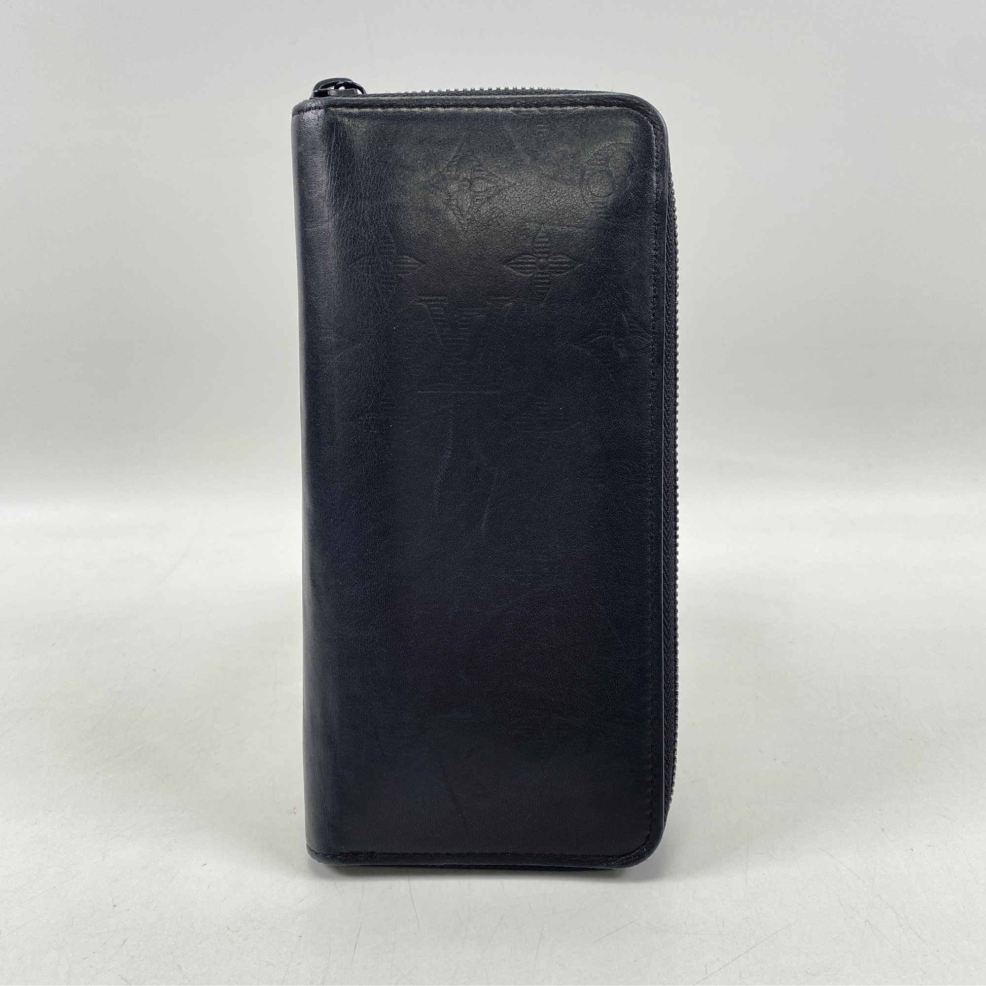 ルイ・ヴィトン モノグラムシャドウ ジッピーウォレット ヴェルティカル 黒 Bランク