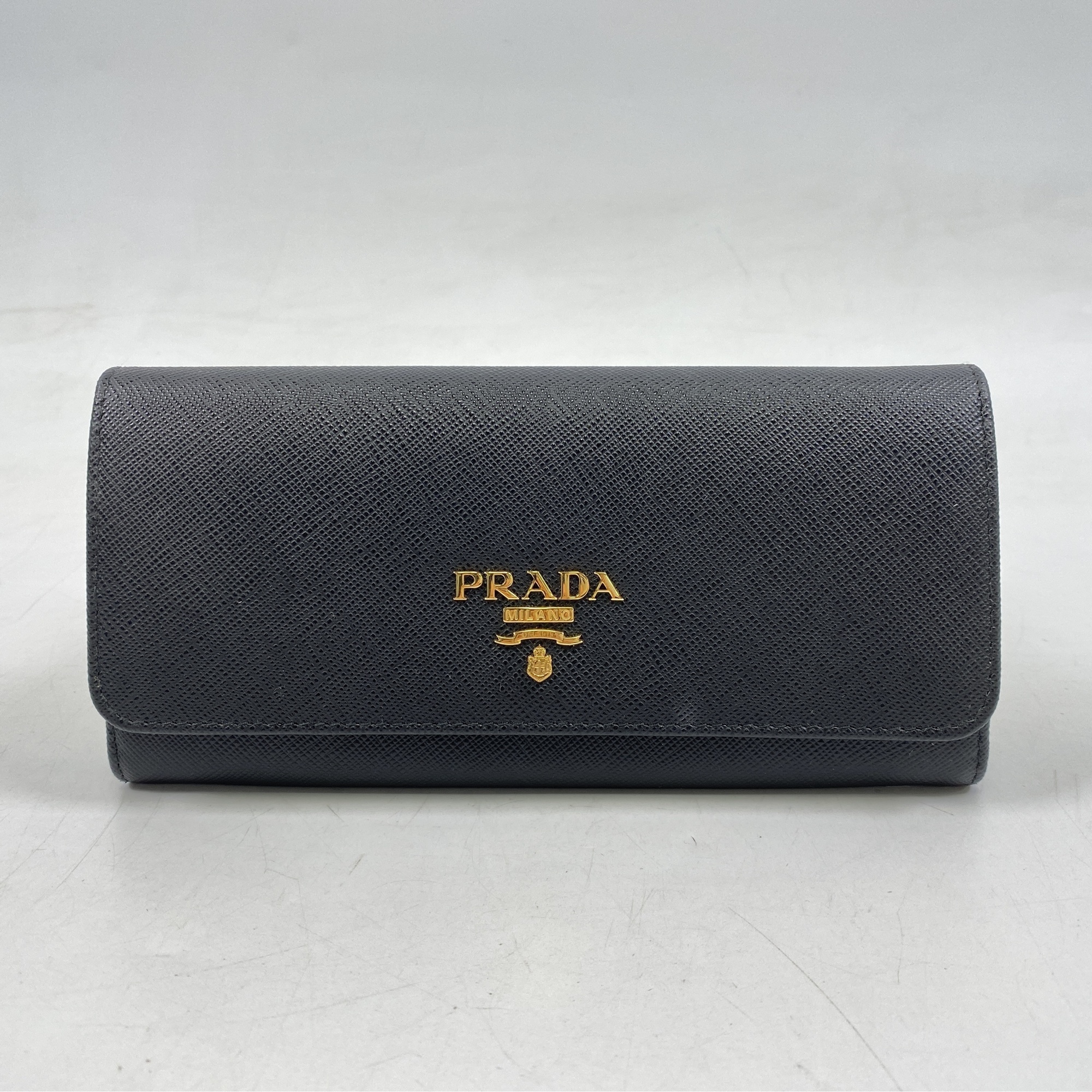 プラダ 二つ折り長財布 黒×赤 サフィアーノ Bランク