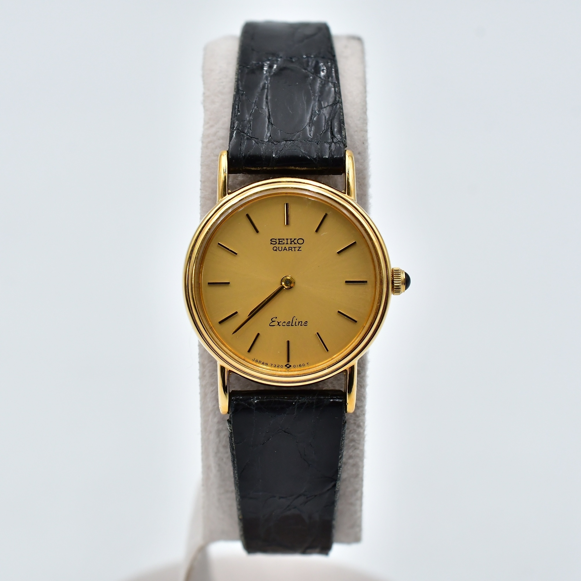 天皇　額 セイコー エクセリーヌ シャンパン文字盤 GP×革/QZ 7320-0070 買取実績