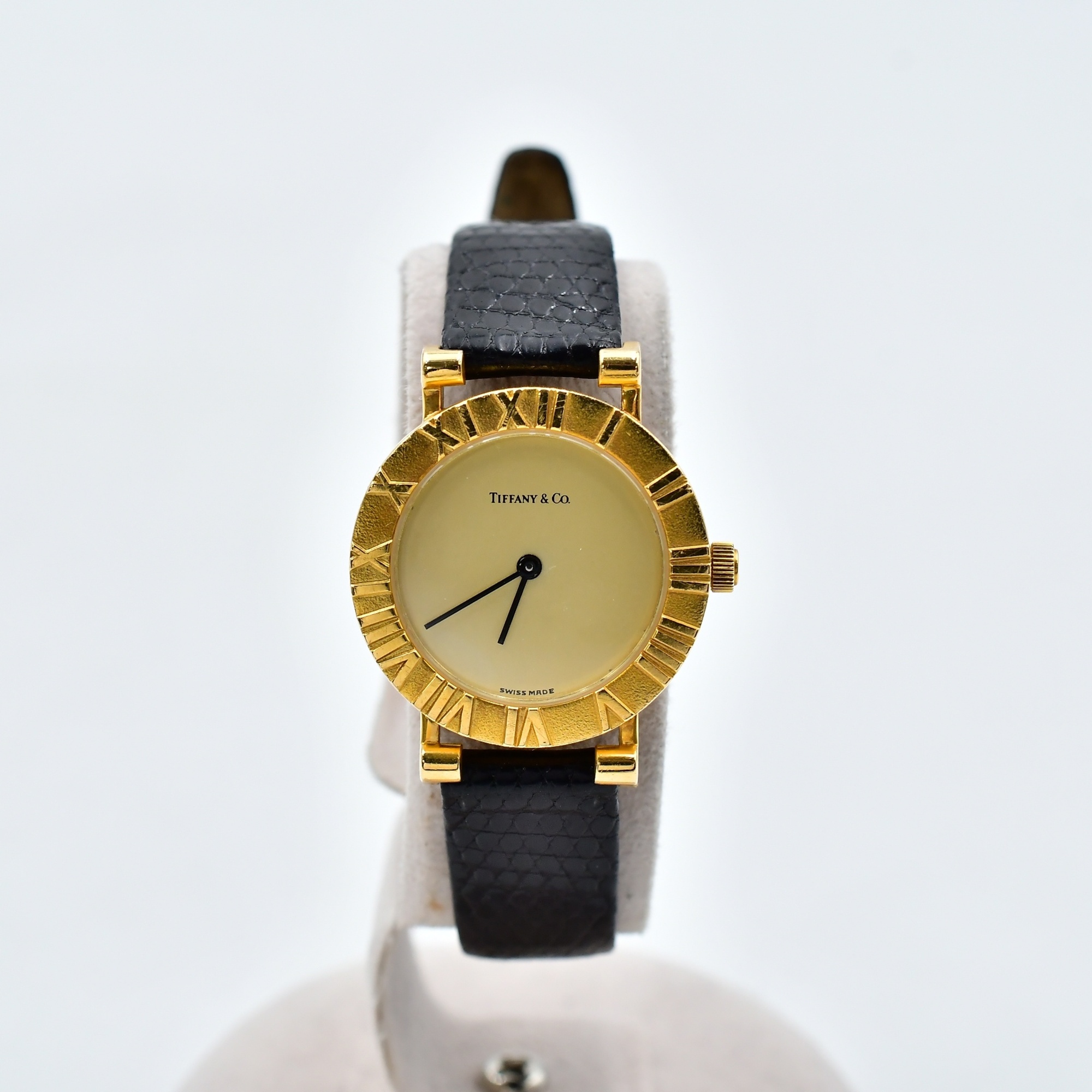 ティファニー アトラス シャンパン文字盤 YG×革/QZ Cランク