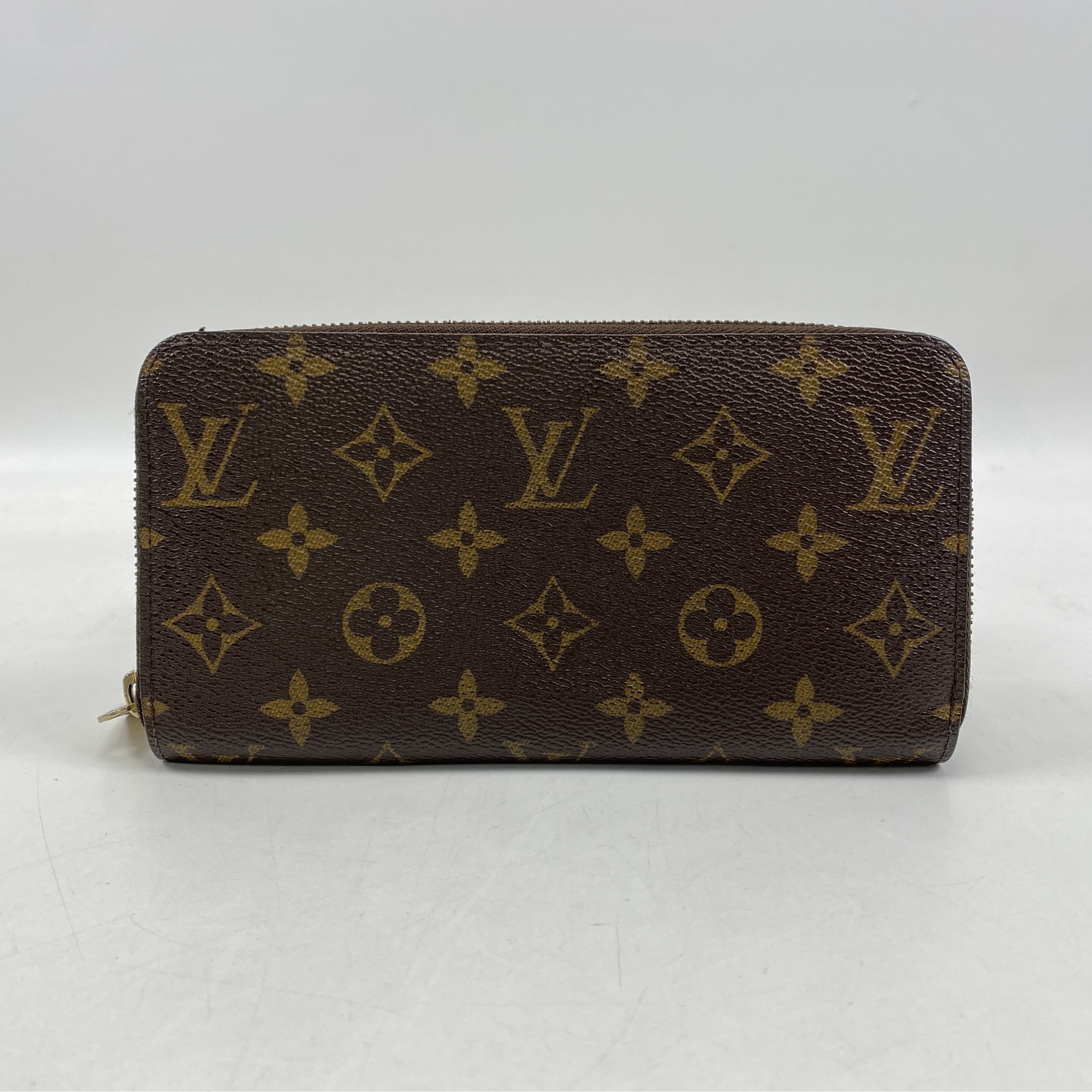 ルイ・ヴィトン モノグラム ジッピーウォレット ブラウン PVC×レザー M60017 Bランク