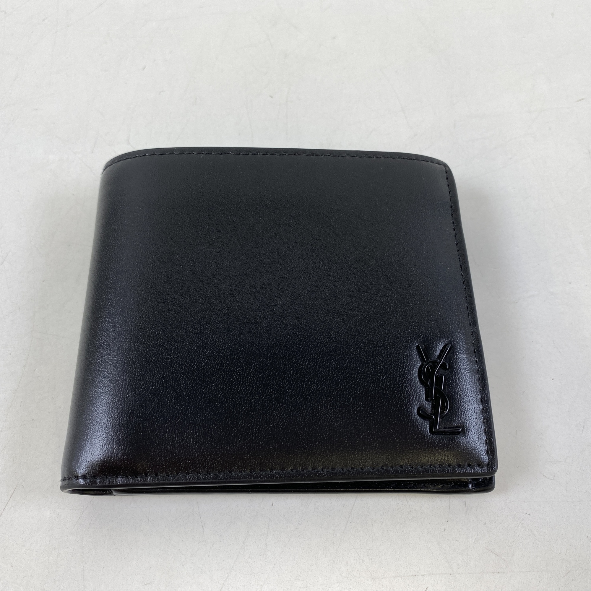 サンローラン カサンドラ 二つ折り財布 レザー 黒 610193 買取実績