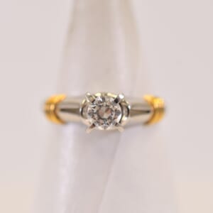 ディオール ダイヤリング Pt900/K18 9/1 0.27ct