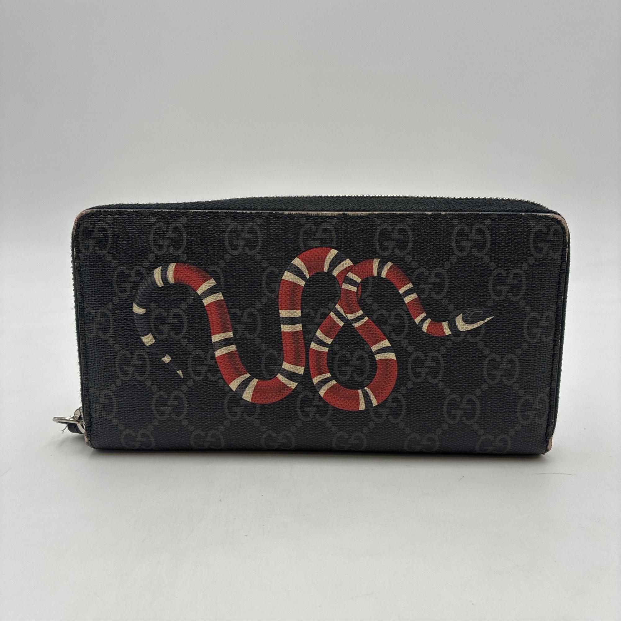 GUCCI ブラック　スネーク　(値下げ交渉あり) グッチ スネーク ラウンドジップ長財布 451273 買取実績【買取日：2026