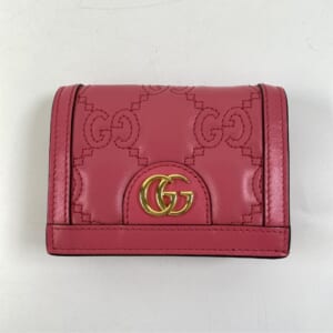 グッチ GGマトラッセ 二つ折り財布 ピンク レザー 723786