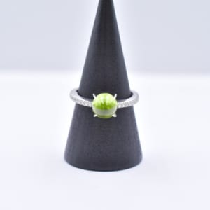 ギメル ペリドット メレダイヤリング Pt950 P2.391ct D0.192ct 買取実績【買取日：2023年8月28日】